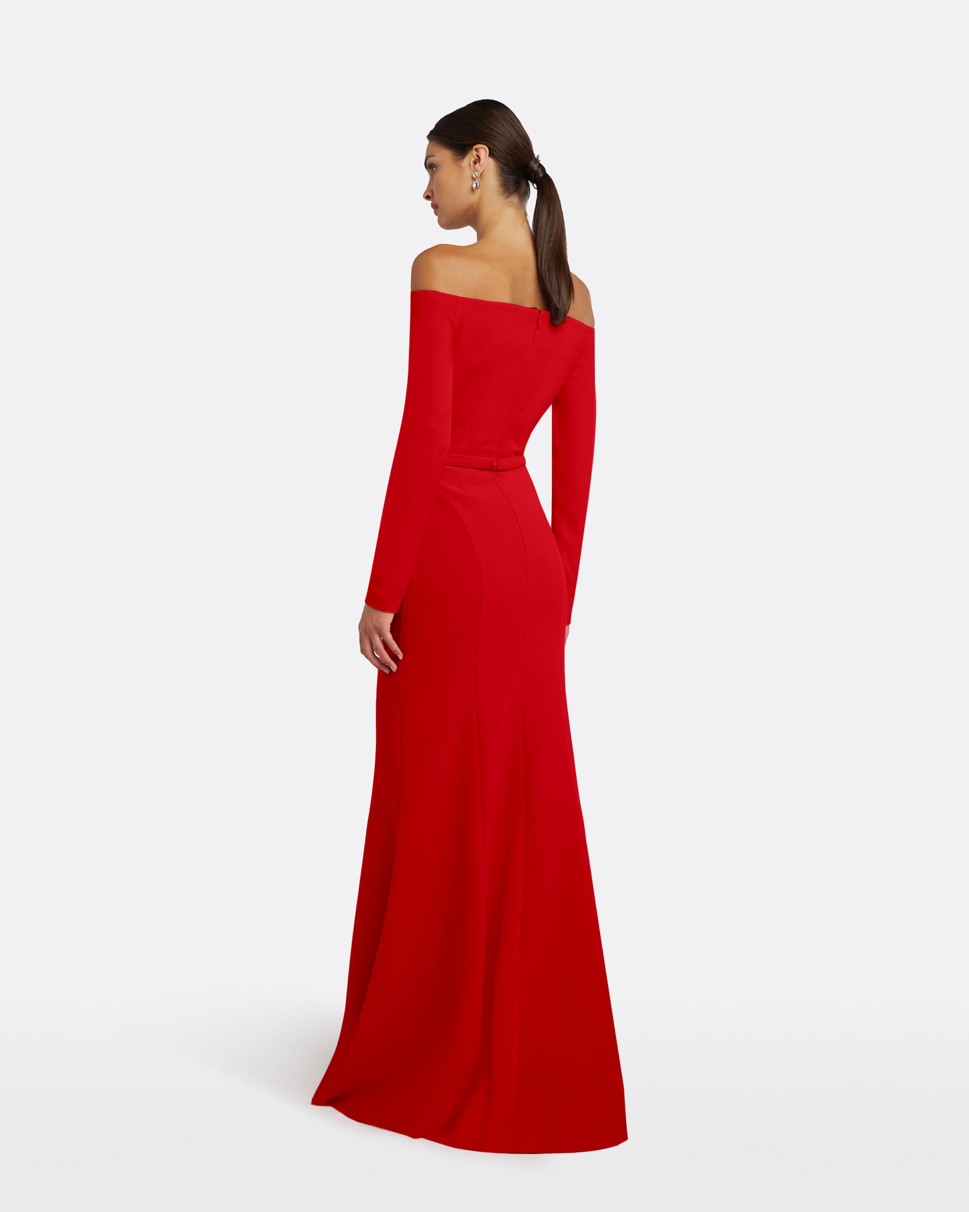 Red off-shoulder gown with cut-out design on a white background, back view