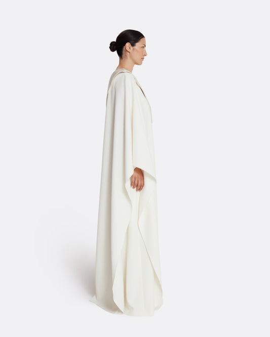 Asymmetric gown with drapped sleeve detail in IVORY